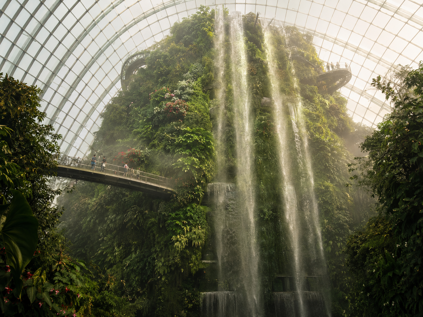 Inside the Cloud Forest dome — 35m mountain draped with tropical plants and a spectacular indoor waterfall